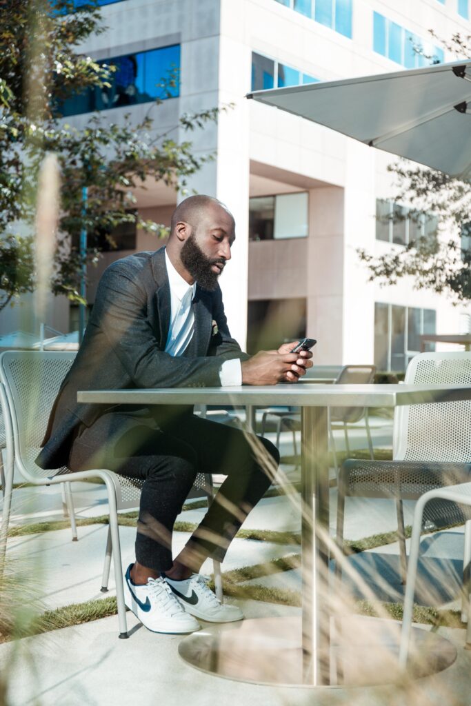 man looking at phone